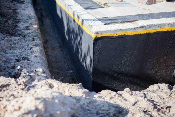 Professional Waterproofing technician working in Lacarne, OH